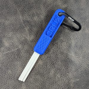 Blue mini CRUX Original Gold Brush with long white bristles for gold prospecting bedrock cleaning.